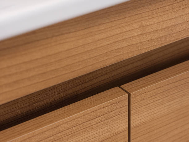 detail of wooden bathroom cabinet door, wood veneer